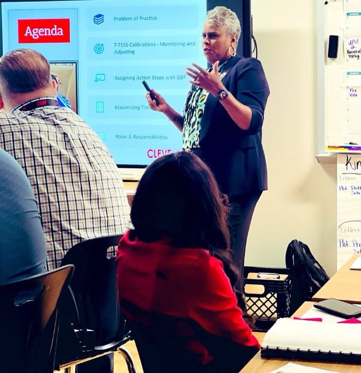 Dr. Rachel Alex presenting training session with agenda slide