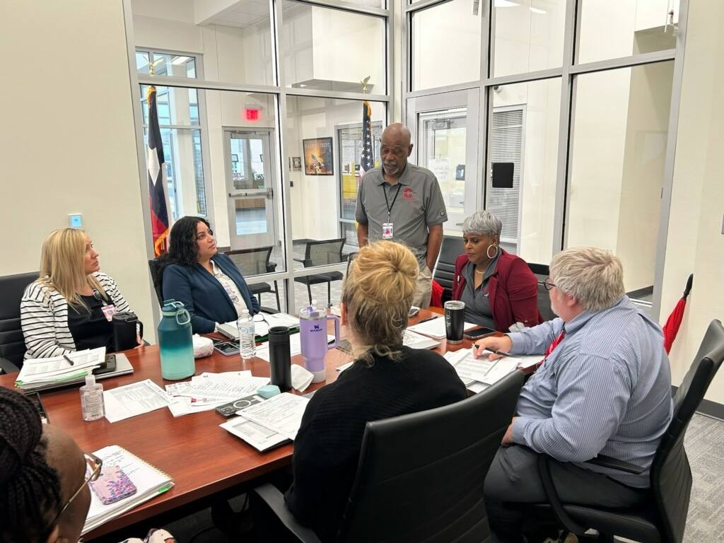 Dr. Rachel Alex in a team meeting